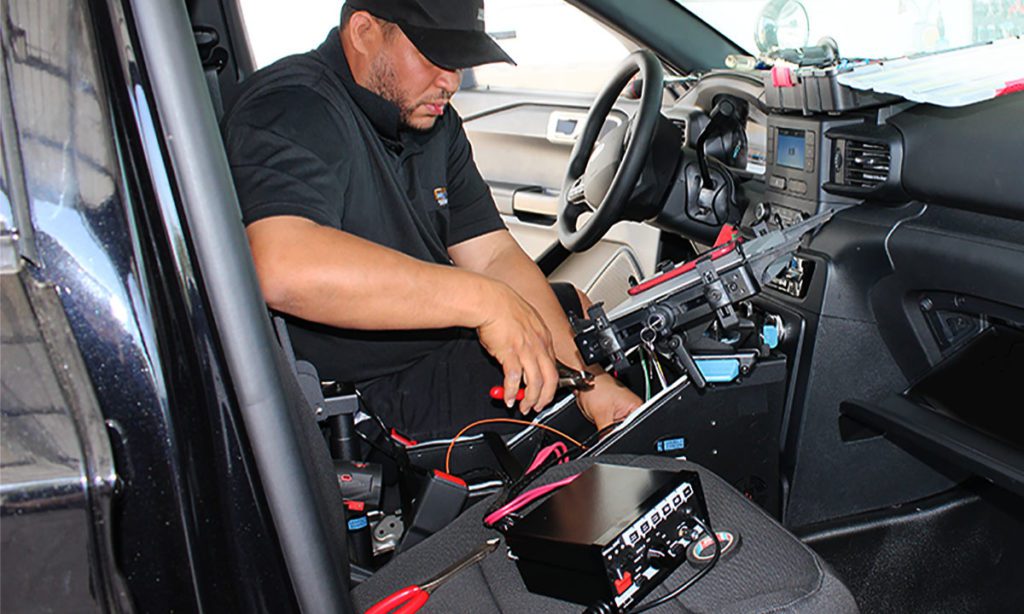 Man working on Outfitting Vehicle